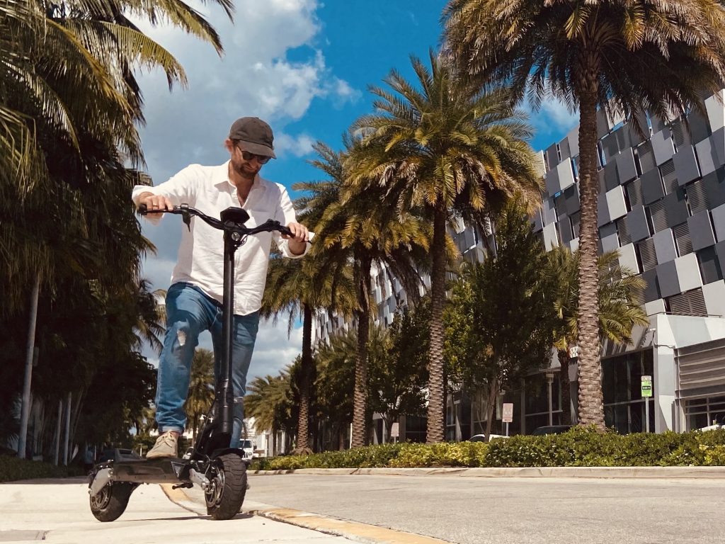 Fluidfreeride founder and CEO Julian Fernau riding the Apollo Phantom in Miami. He sells escooters exclusively.