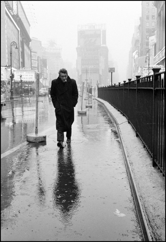 Photography from Dennis Stock_James Dean in Times Square, New York City, New York, USA, 1955 © Dennis Stock_Magnum Photos